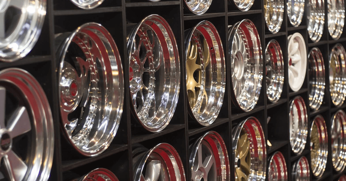Parts shop - different types of car wheels on the shelve